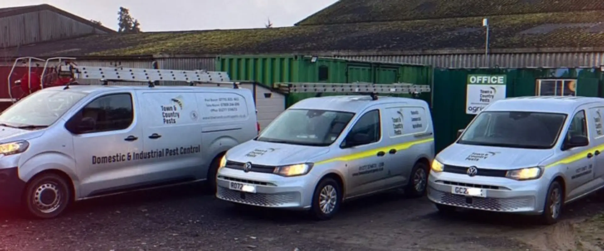 Town and country vans in shipping yard